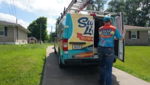 Sweet Life Heating, Cooling and Electric technician performing HVAC services in Lexington, KY. 